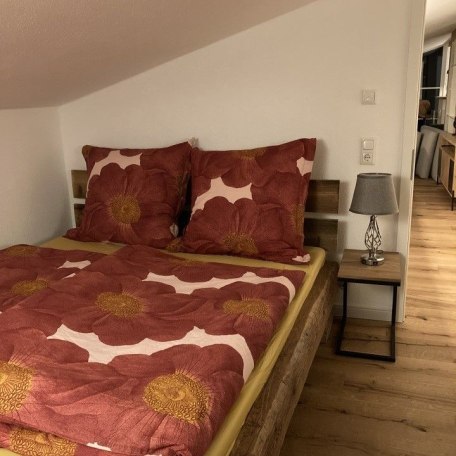 Schlafzimmer mit Doppelbett, &copy; (c)nagelspitz-nest_schliersee_Foto H.Werlberger