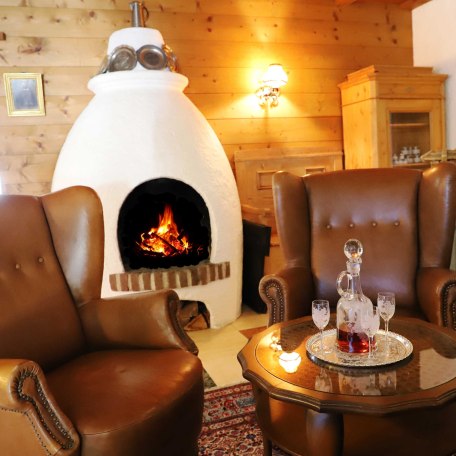 gemütliche Sitzecke mit offenem Kamin, © im-web.de/ Tourist-Information Bayrischzell