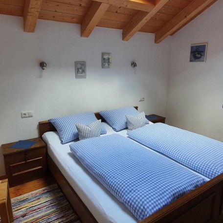 Schlafzimmer, © im-web.de/ Tourist-Information Bayrischzell