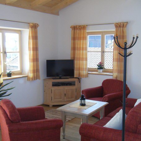 Wohnbereich mit Sitzecke Fewo West, &copy; Eigenes Bild Pfatischer